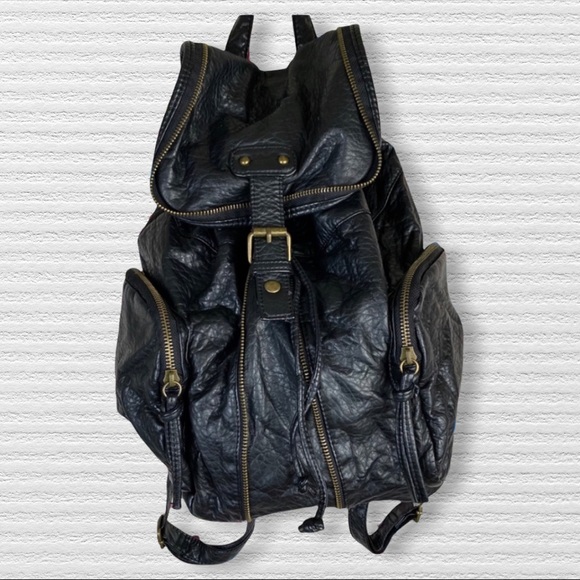 Under One Sky Handbags - Black backpack 🎒 PU Leather lots of zipper